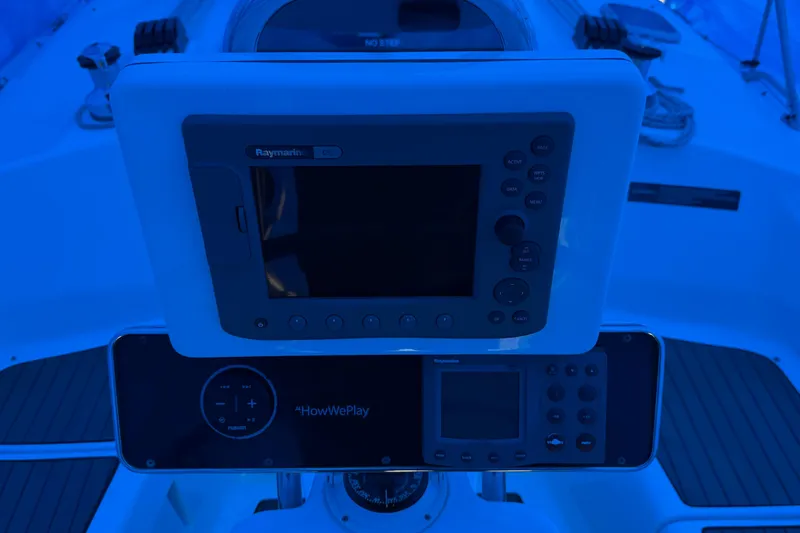 Slide: The Image of Cockpit of 2005 Hunter 38 sailboat with Raymarine navigation equipment. - 27