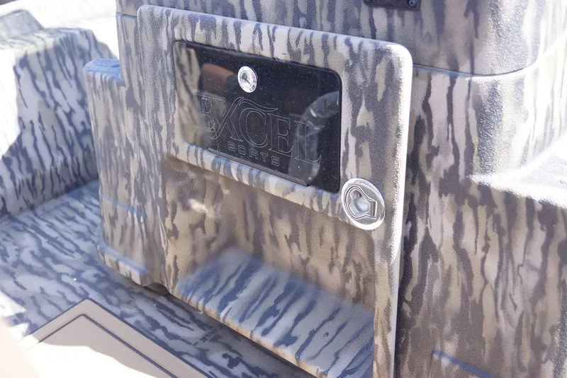 Slide: The Image of 2026 Excel 203 Bay Pro Elite boat with camouflage design and logo detail. - 10