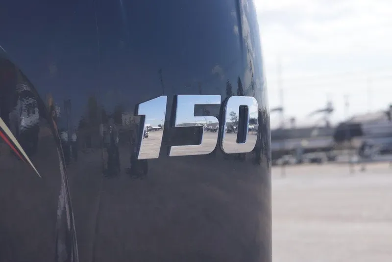 Slide: The Image of Close-up of '150' emblem on 2026 Excel 203 Bay Pro Elite boat. - 6