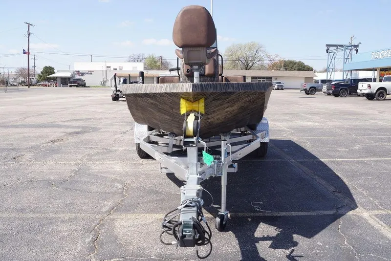 Slide: The Image of 2026 Excel 203 Bay Pro Elite boat on trailer in parking lot. - 7