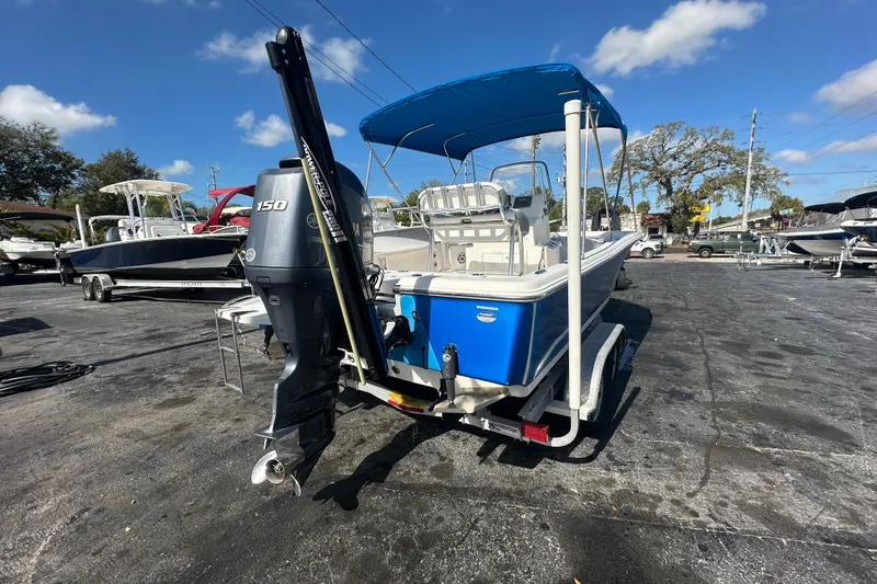 Slide: The Image of 2015 Tidewater 2000 Carolina Bay boat with Yamaha 150 engine on trailer. - 4