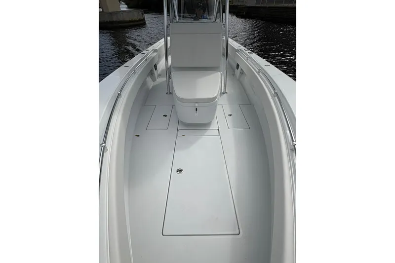 Slide: The Image of 2025 Contender 32 ST boat interior, showcasing sleek design and spacious deck layout. - 19