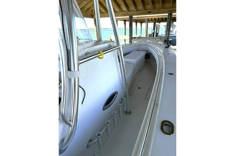 Slide: The Image of 2025 Contender 32 ST boat interior with sleek design and rod holders. - 29