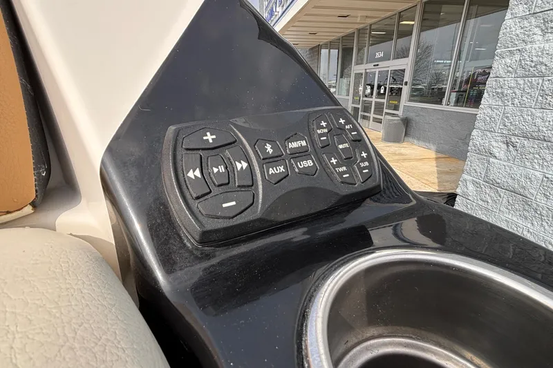 Slide: The Image of Control panel of 2021 Tigé 25ZX boat with audio and connectivity options. - 17
