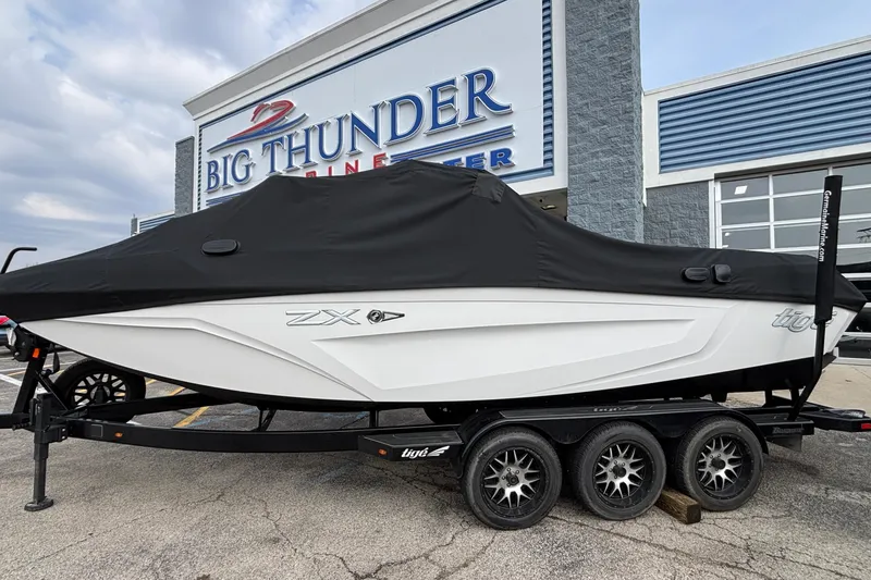 Slide: The Image of 2021 Tigé 25ZX boat with cover at Big Thunder Marine Center. - 24