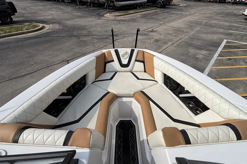 Slide: The Image of 2021 Tigé 25ZX boat interior with luxurious seating and modern design. - 29