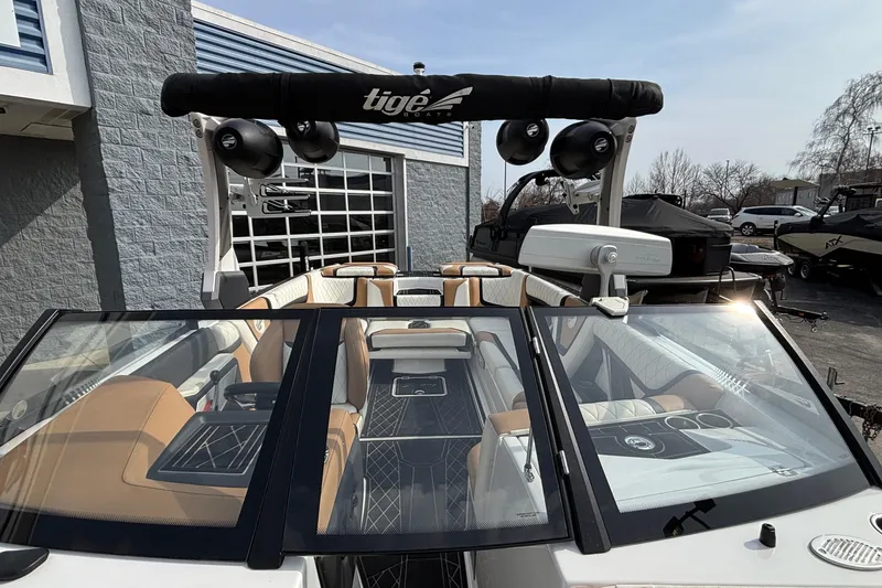 Slide: The Image of 2021 Tigé 25ZX boat interior with premium seating and advanced audio system. - 38