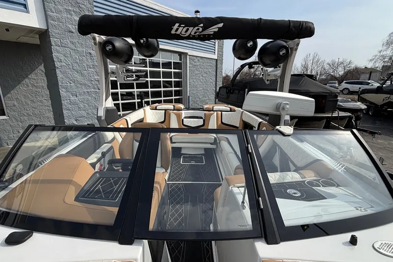 Slide: The Image of 2021 Tigé 25ZX boat interior with premium seating and advanced audio system. - 39