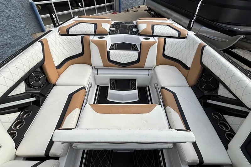 Slide: The Image of 2021 Tigé 25ZX boat interior with luxurious seating and modern design. - 5