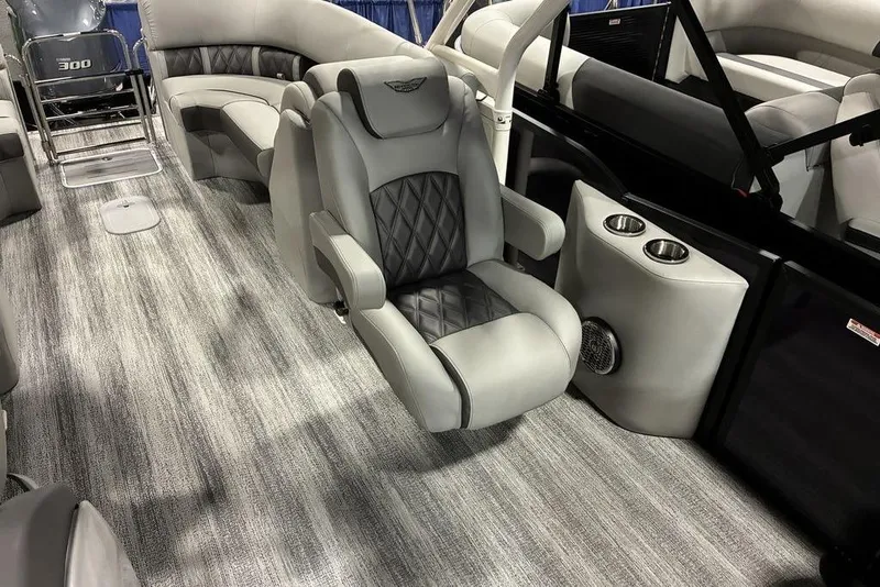 Slide: The Image of 2025 Bennington LX Sport Quad Bench 24 LXSFBA interior with luxurious seating and modern design. - 3