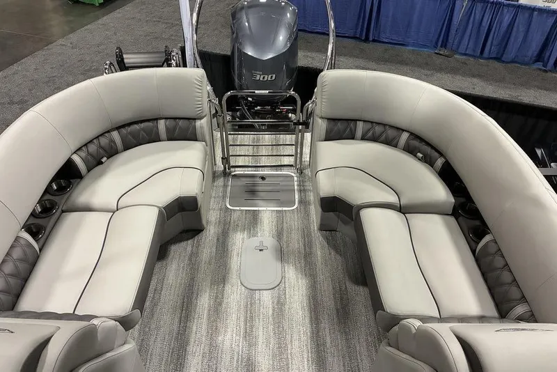 Slide: The Image of 2025 Bennington LX Sport Quad Bench 24 LXSFBA interior with luxurious seating and modern design. - 4