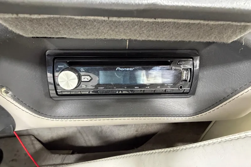 Slide: The Image of Pioneer stereo system in 2004 Malibu Wakesetter 23 LSV boat dashboard. - 10