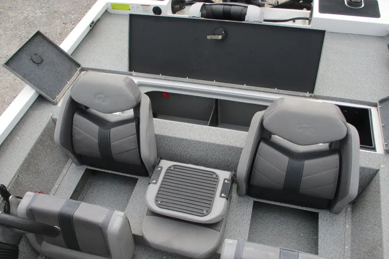 Slide: The Image of 2021 G3 Sportsman 1710 boat interior with seating and storage compartments. - 10