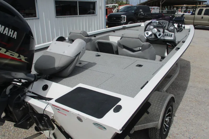 Slide: The Image of 2021 G3 Sportsman 1710 boat with Yamaha engine, featuring spacious deck and modern controls. - 5