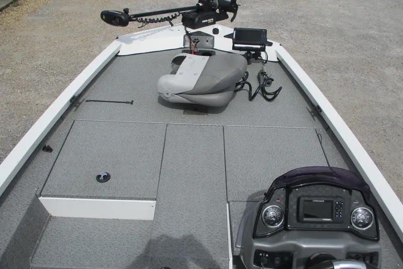 Slide: The Image of 2021 G3 Sportsman 1710 boat interior with fishing seat and control panel. - 6