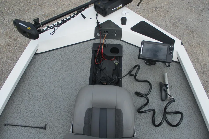 Slide: The Image of 2021 G3 Sportsman 1710 boat interior with Minn Kota trolling motor and Lowrance fish finder. - 7