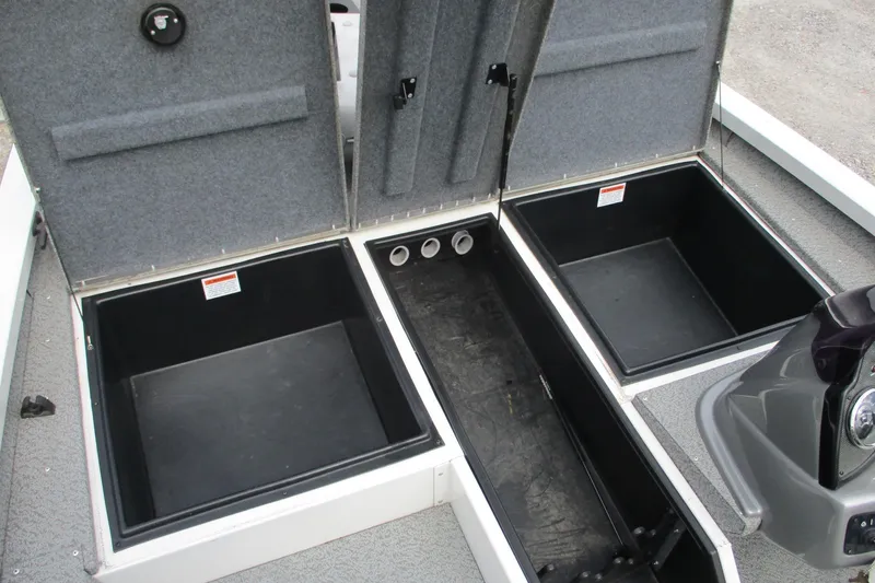 Slide: The Image of 2021 G3 Sportsman 1710 boat storage compartments open, showcasing spacious interior. - 8