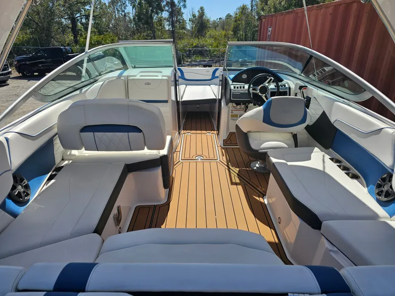 Slide: The Image of Interior of a 2019 Regal 23 OBX boat with luxurious seating. - 2