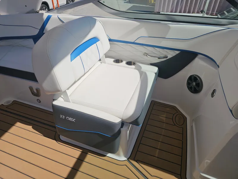 Slide: The Image of Interior of a 2019 Regal 23 OBX boat with white seating. - 20