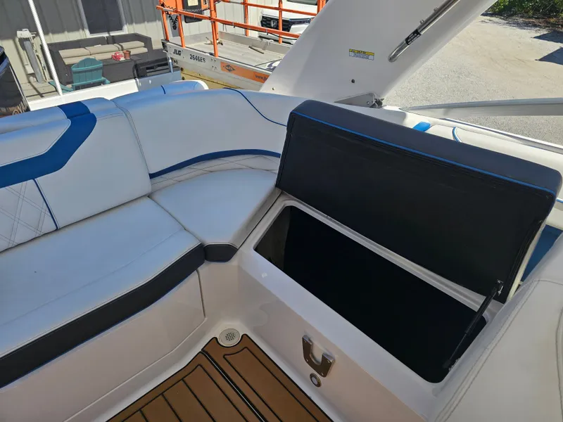 Slide: The Image of Interior of 2019 Regal 23 OBX with seating and storage. - 28