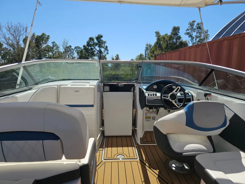 Slide: The Image of Interior of a 2019 Regal 23 OBX boat with helm station. - 33