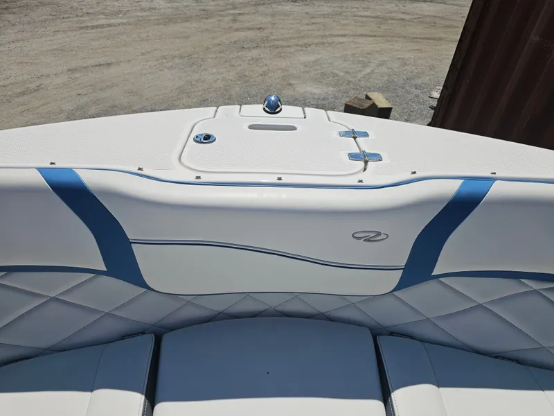 Slide: The Image of Interior view of a 2019 Regal 23 OBX boat with blue accents. - 4