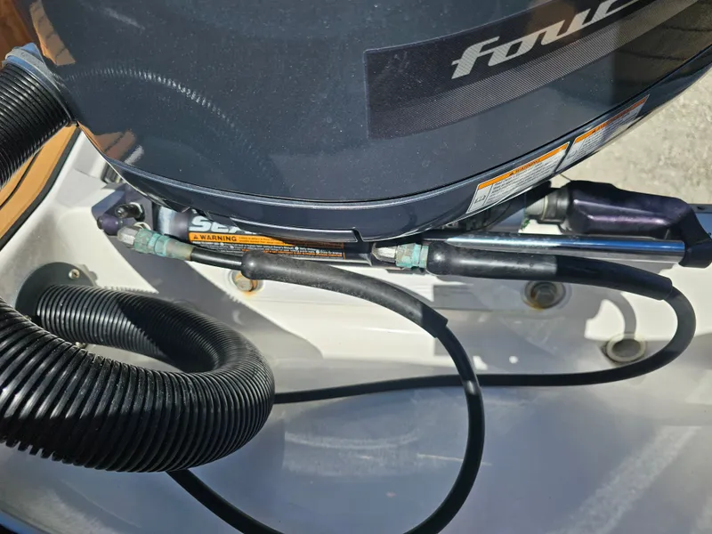 Slide: The Image of Close-up of a 2019 Regal 23 OBX outboard motor. - 45