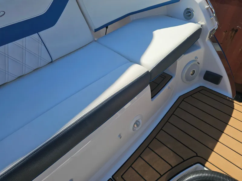 Slide: The Image of Regal 23 OBX 2019 boat seat with wooden flooring. - 46
