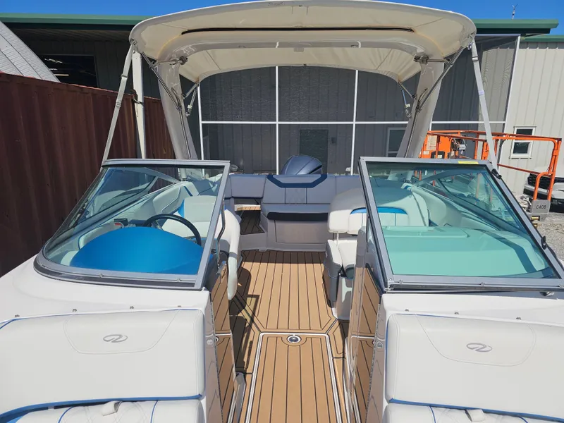Slide: The Image of Interior view of a 2019 Regal 23 OBX boat with canopy. - 6