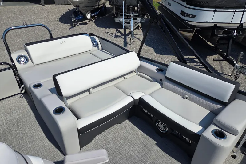 Slide: The Image of 2026 Avalon Platinum Catalina 2585 Versatile Rear Lounger with luxurious seating and cup holders. - 5
