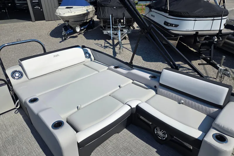 Slide: The Image of 2026 Avalon Platinum Catalina 2585 Versatile Rear Lounger with luxurious seating and cup holders. - 6