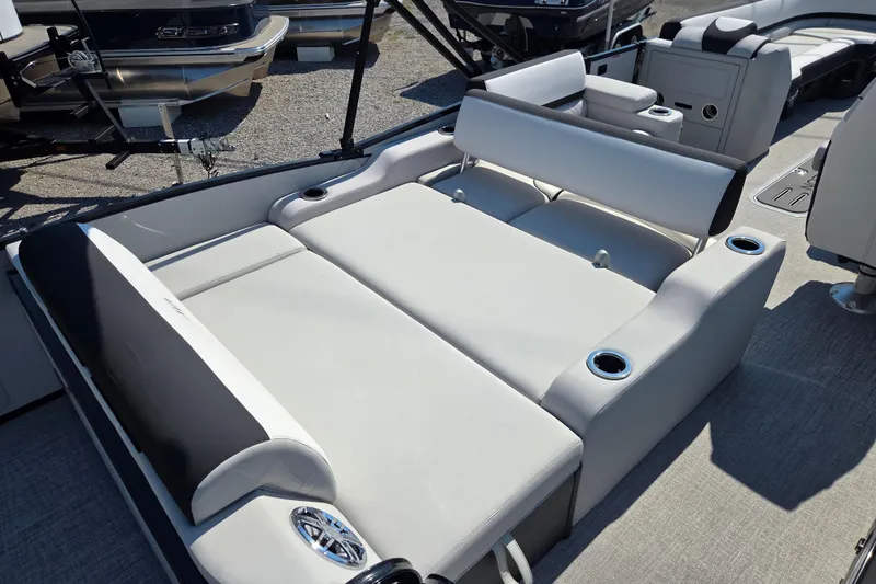 Slide: The Image of 2026 Avalon Platinum Catalina 2585 Versatile Rear Lounger with luxurious seating and cup holders. - 7