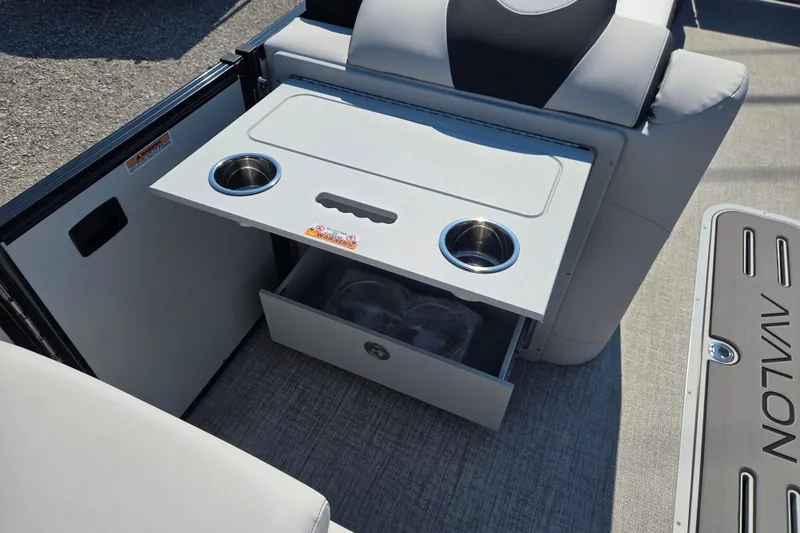 Slide: The Image of 2026 Avalon Platinum Catalina 2585 Versatile Rear Lounger with cup holders and storage drawer. - 9