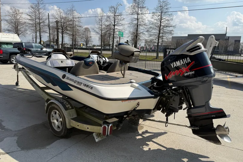 Slide: The Image of 2007 Ranger 188 VS boat with Yamaha VMAX engine on trailer, parked outdoors. - 4