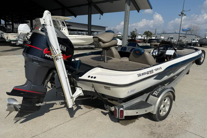 Slide: The Image of 2007 Ranger 188 VS boat with Yamaha outboard motor in a marina setting. - 6