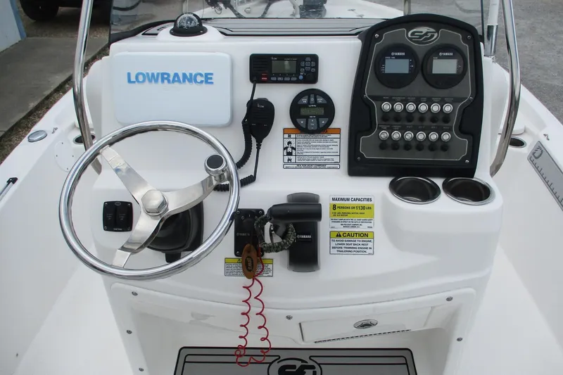 Slide: The Image of 2020 Sea Fox 220 Viper boat console with steering wheel and control panel. - 12