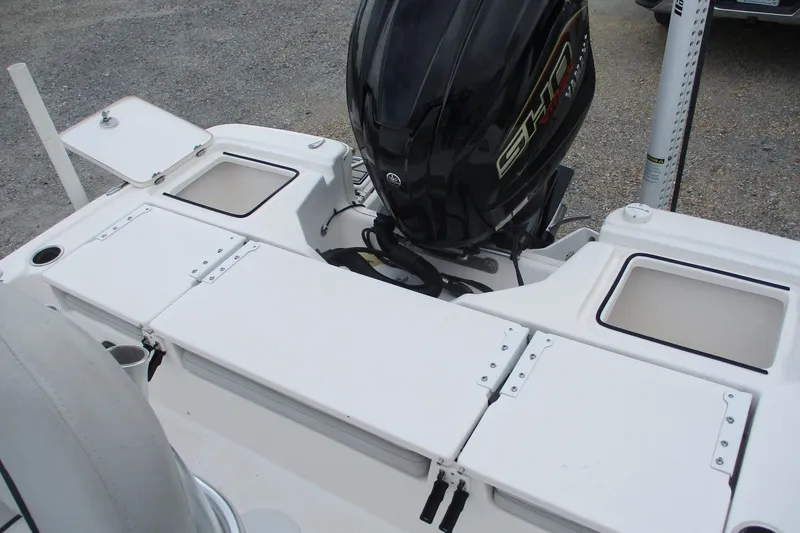 Slide: The Image of 2020 Sea Fox 220 Viper boat with outboard motor and storage compartments. - 8