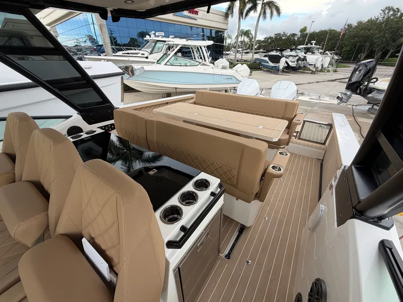Slide: The Image of The image shows the cockpit of a 2027 Saxdor 320 GTO with beige seats and modern design. - 23