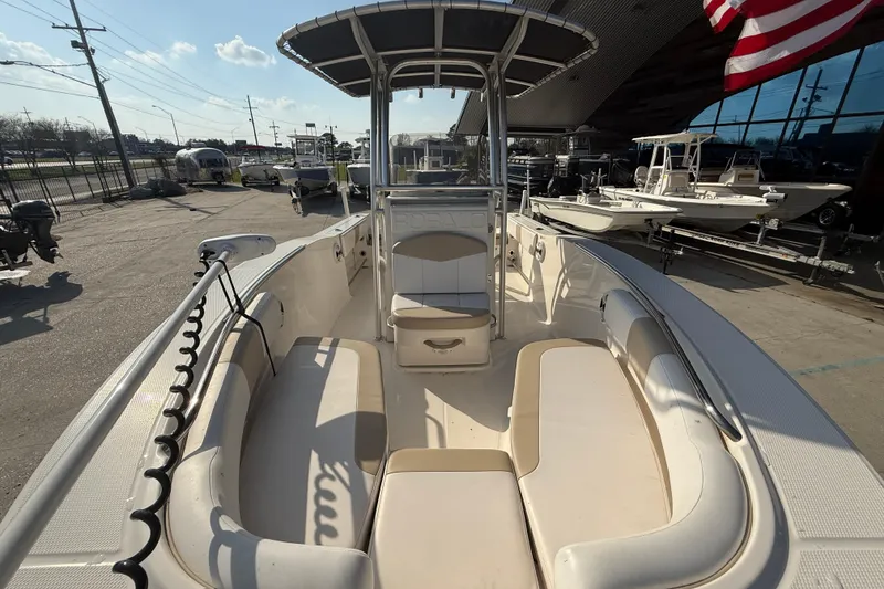 Slide: The Image of 2018 Robalo R200 Center Console boat with spacious seating and modern design. - 10
