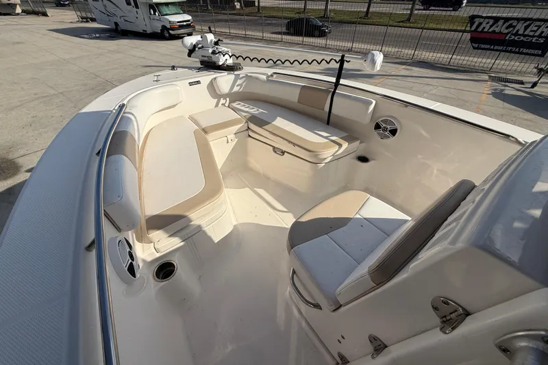 Slide: The Image of 2018 Robalo R200 Center Console boat interior with seating and storage. - 9