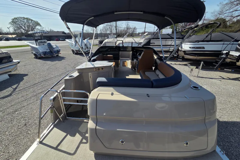 Slide: The Image of 2026 Avalon Platinum Catalina 2585 Windshield Elite pontoon boat with canopy and seating. - 14