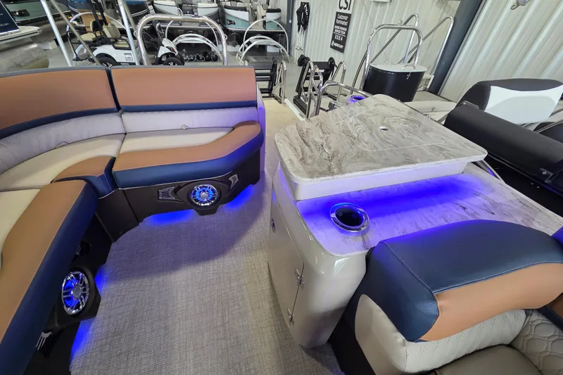 Slide: The Image of Luxurious interior of 2026 Avalon Platinum Catalina 2585 Windshield Elite with ambient blue lighting. - 15