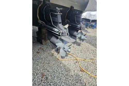 Slide: The Image of 2010 Formula 34 Performance Cruiser propellers on gravel surface. - 14