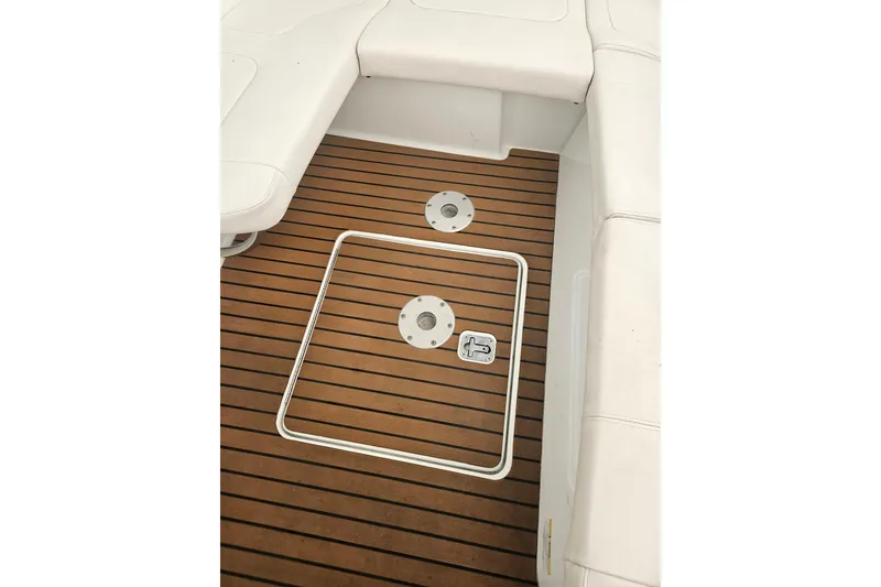 Slide: The Image of 2010 Formula 34 Performance Cruiser deck with teak flooring and white seating. - 20