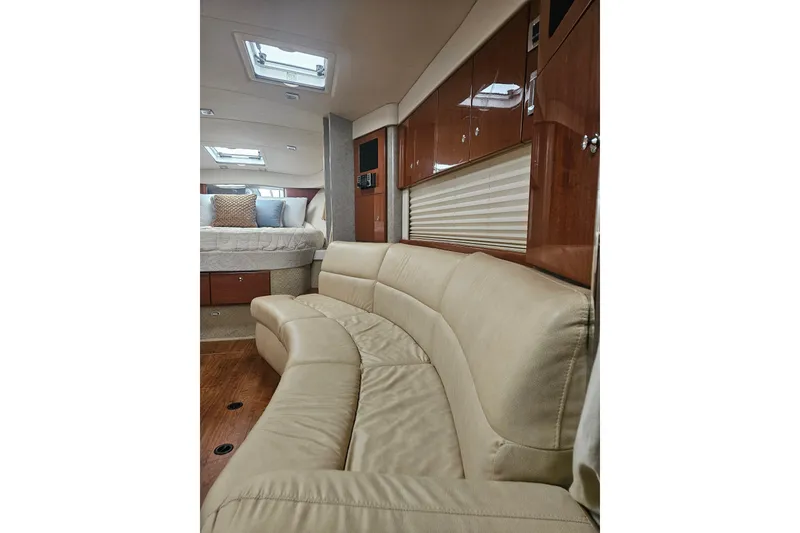 Slide: The Image of Luxurious interior of 2010 Formula 34 Performance Cruiser with leather seating and wood cabinetry. - 29