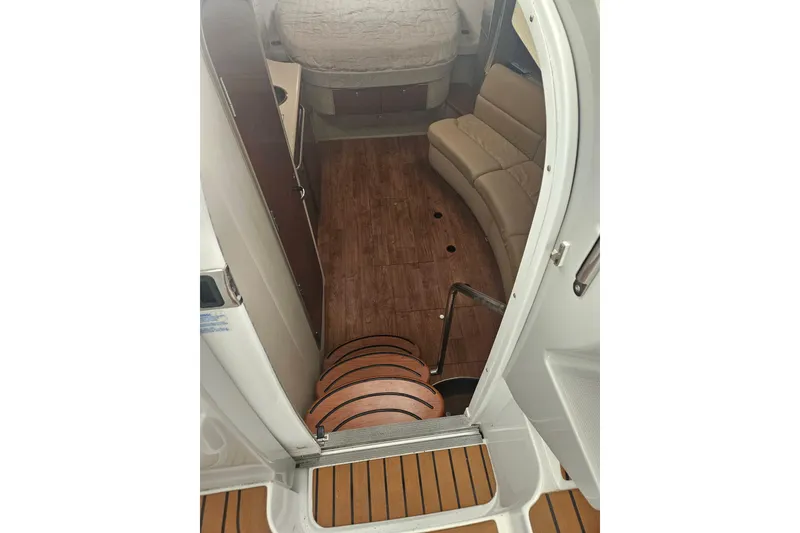 Slide: The Image of Interior view of 2010 Formula 34 Performance Cruiser with wood flooring and seating area. - 44