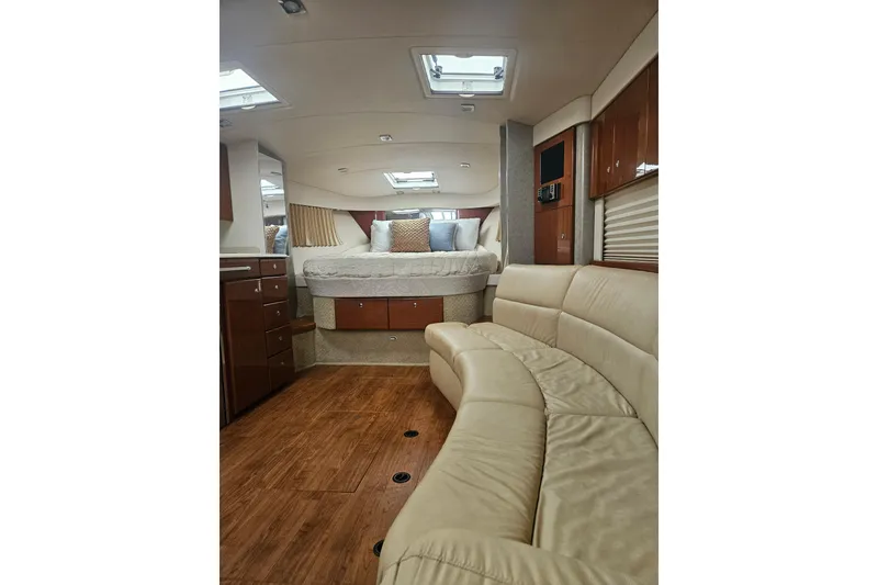 Slide: The Image of Interior of 2010 Formula 34 Performance Cruiser with cozy seating and elegant wood finishes. - 54