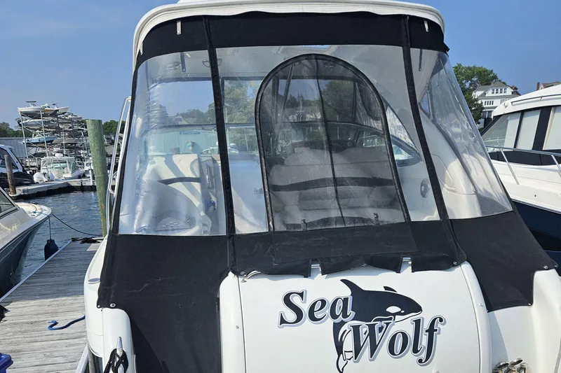 Slide: The Image of 2010 Formula 34 Performance Cruiser "Sea Wolf" docked at marina, rear view. - 6