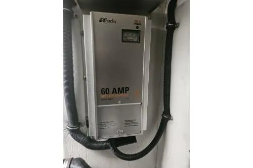 Slide: The Image of 60 AMP battery charger in a 2010 Formula 34 Performance Cruiser. - 62