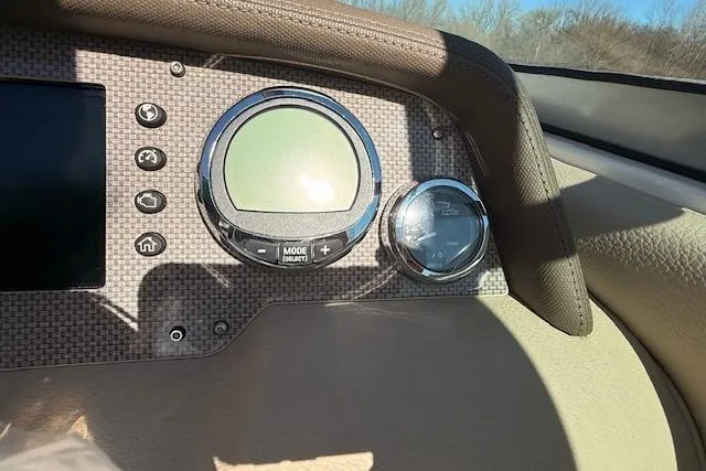 Slide: The Image of Dashboard of 2013 Regal 2500 Bowrider boat with control panel and gauges. - 10